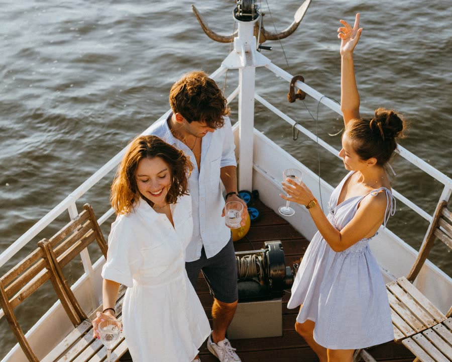 Friends relaxing on the deck of a Miami charter yacht